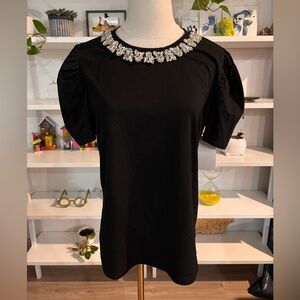 Elegant Black Top with Embellished Neckline